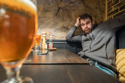 Portrait of man holding wineglass