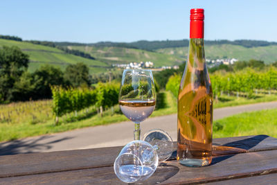 Glass of wine glasses on table