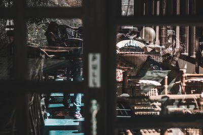 Close-up of building seen through glass window