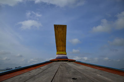 Low angle view of metallic structure against sky