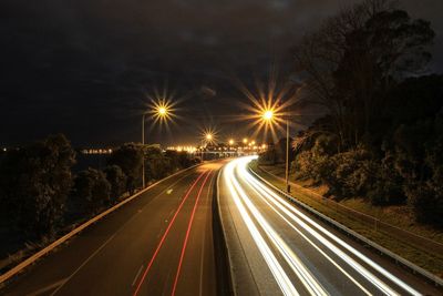 Light trails on road at night