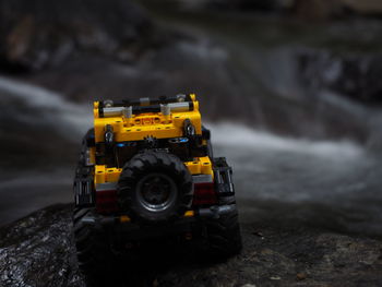 Close-up of toy car on field