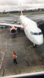 High angle view of airplane on runway