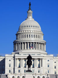 Low angle view of government building against clear sky