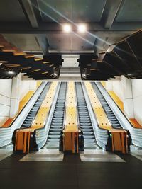 Low angle view of illuminated subway station platform