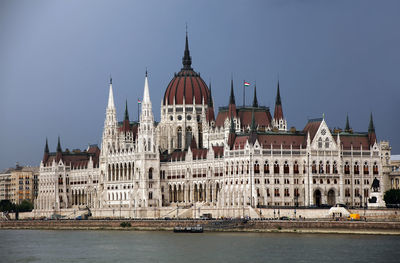 Buildings in city against sky