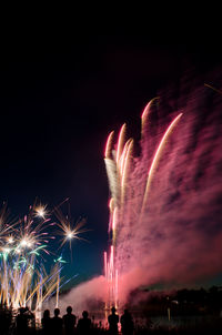 Firework display at night