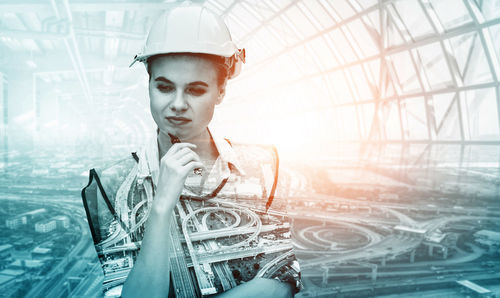 Portrait of man working at construction site