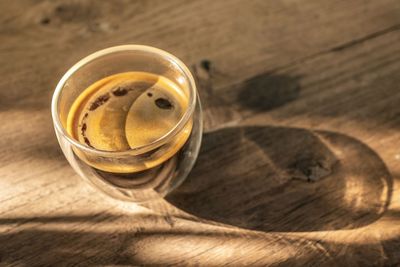 High angle view of coffee cup on table