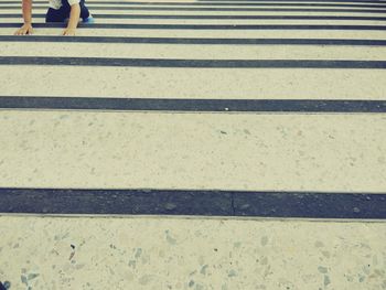 Low section of zebra crossing on road