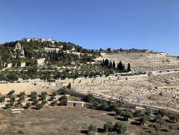 Panoramic view of ancient buildings against clear blue sky in jerusalem