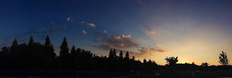 Scenic view of landscape against sky at sunset