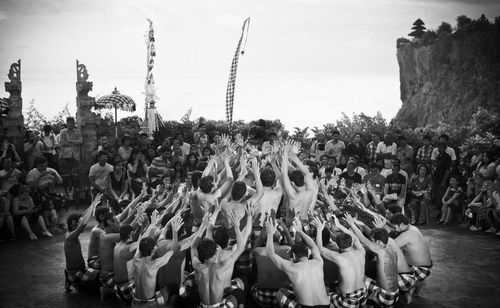 Panoramic view of crowd at concert against sky