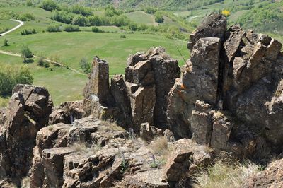 Old ruins on landscape against sky