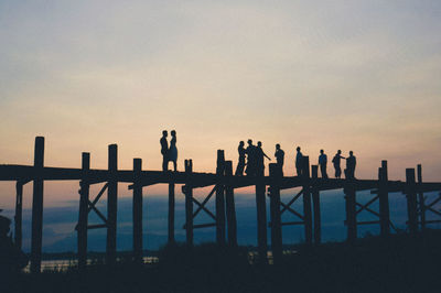 Silhouette of woman at sunset