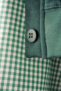 Close-up of buttons on fabric