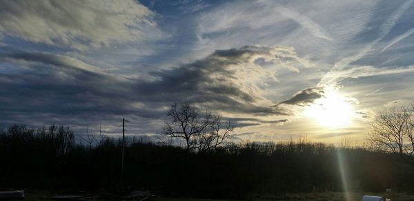 Scenic view of landscape against sky during sunset