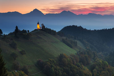 Scenic view of mountains against sky during sunset