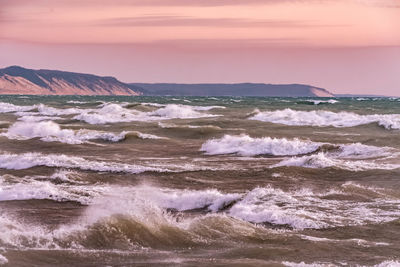 Scenic view of sea against sky during sunset