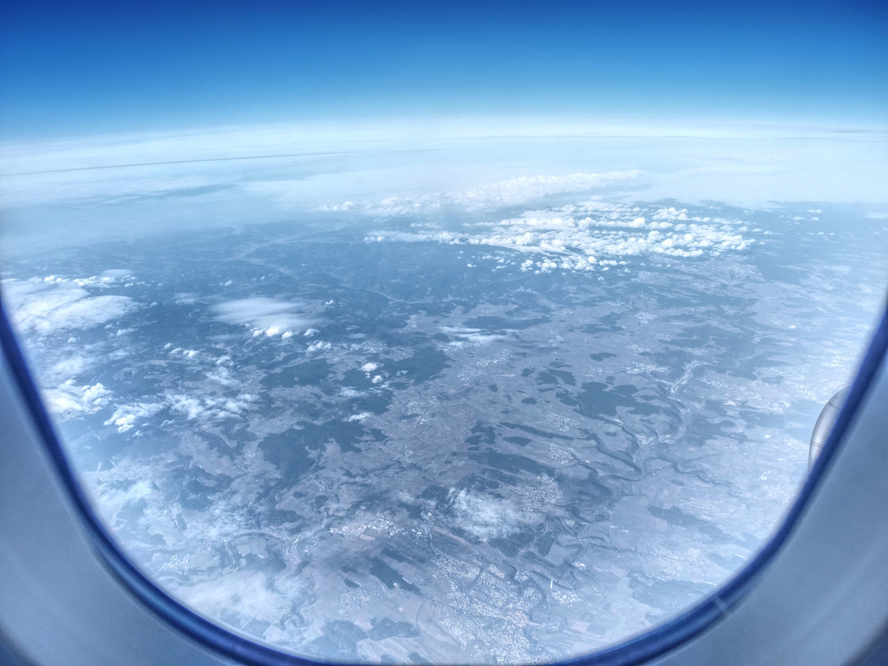 AERIAL VIEW OF SEA SEEN FROM AIRPLANE WINDOW