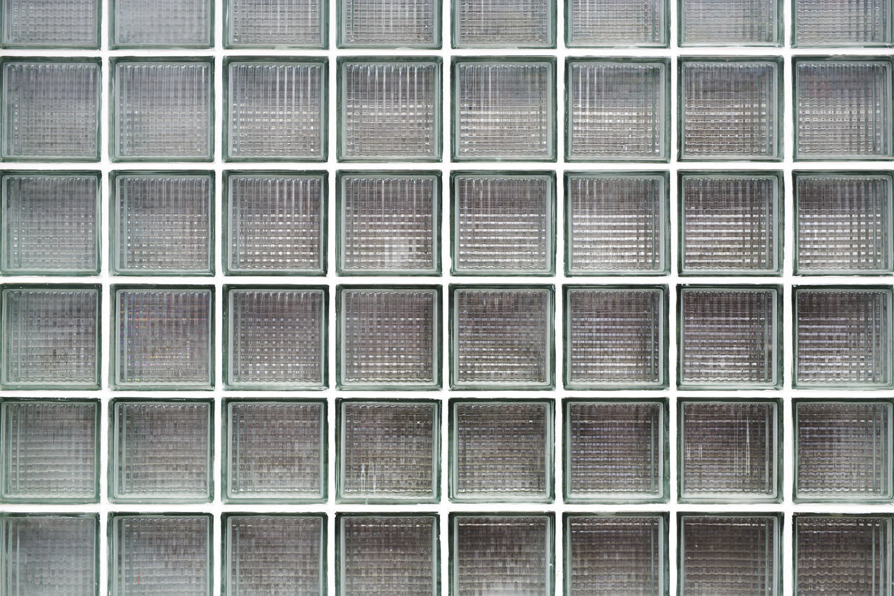 FULL FRAME SHOT OF METAL GRATE WINDOW