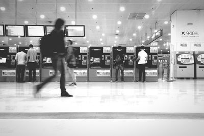 People in illuminated store