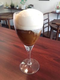 Close-up of beer in glass on table