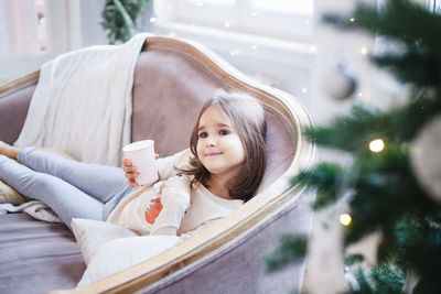 Portrait of cute girl at home