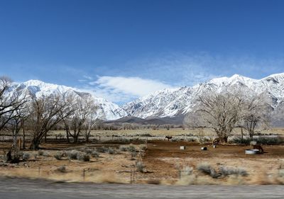 Scenic view of snowcapped mountains and lake against sky