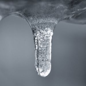 Close-up of ice crystals against sea