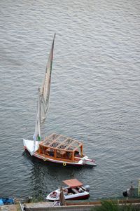 High angle view of sailboats moored in sea