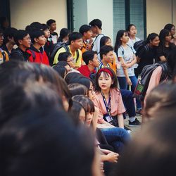 People sitting in corridor