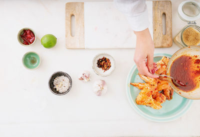 High angle view of man holding food