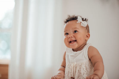 Cute smiling girl at home