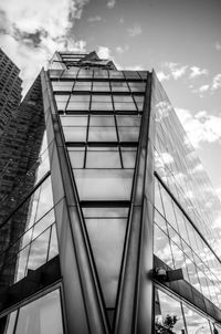 Low angle view of office building against sky