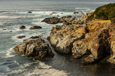 Scenic view of rocks in sea