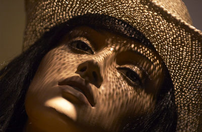 Close-up of female mannequin with sun hat