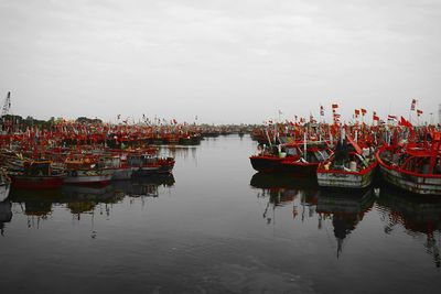 Boats moored in sea