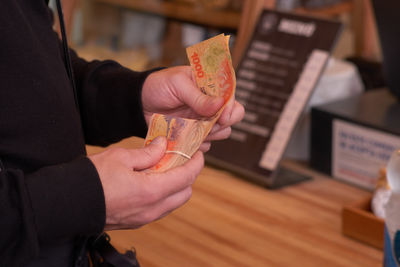 Cropped hand holding heart shape