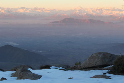 Scenic view of mountains against sky during sunset