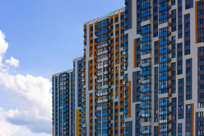 Low angle view of modern buildings against sky