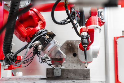 Close-up of robotic welding machinery in factory