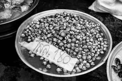 High angle view of seashells for sale in market