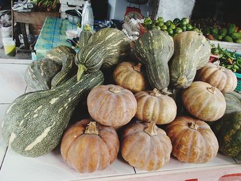 Pumpkins and other vegetables for sale at market