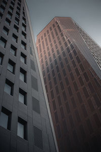 Low angle view of modern building against clear sky