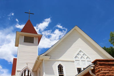 Low angle view of  rural church  against sky