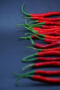 High angle view of red chili peppers on table