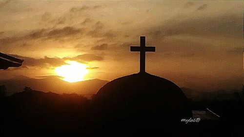 Silhouette of church at sunset