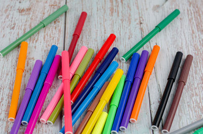 High angle view of multi colored pencils on table