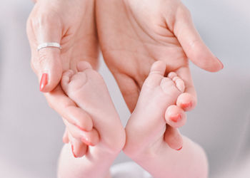 Low section of baby feet